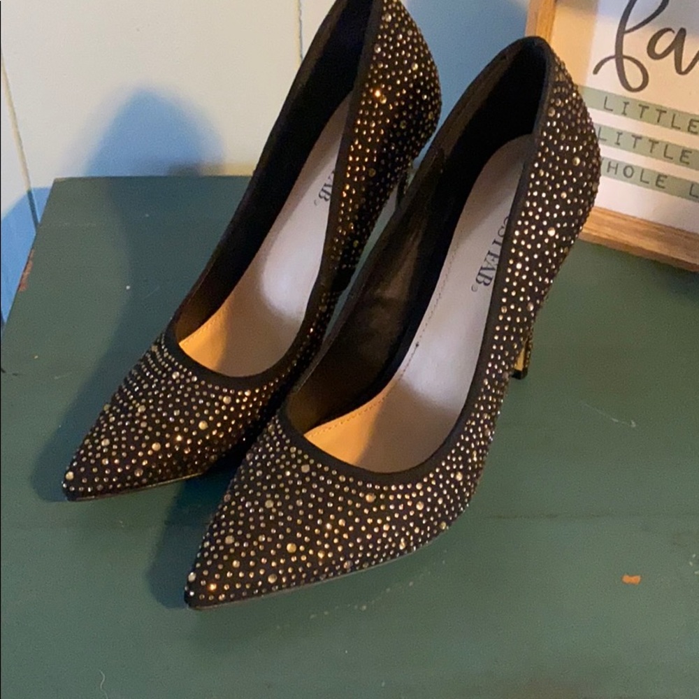 Gold and black heels